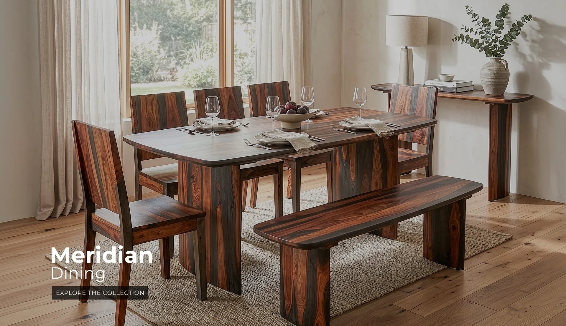 Meridian Dining Collection in Capri Sheesham finish, with matching table, bench and chairs, in a dining room scene.